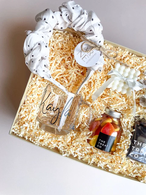 Personalised gift box with glass tumbler, candle, sweet treats and bath accessories